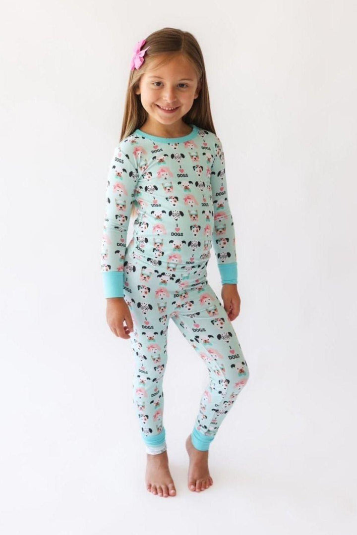 Child wearing I Love Dogs bamboo two-piece pajama set featuring hand-drawn dog print