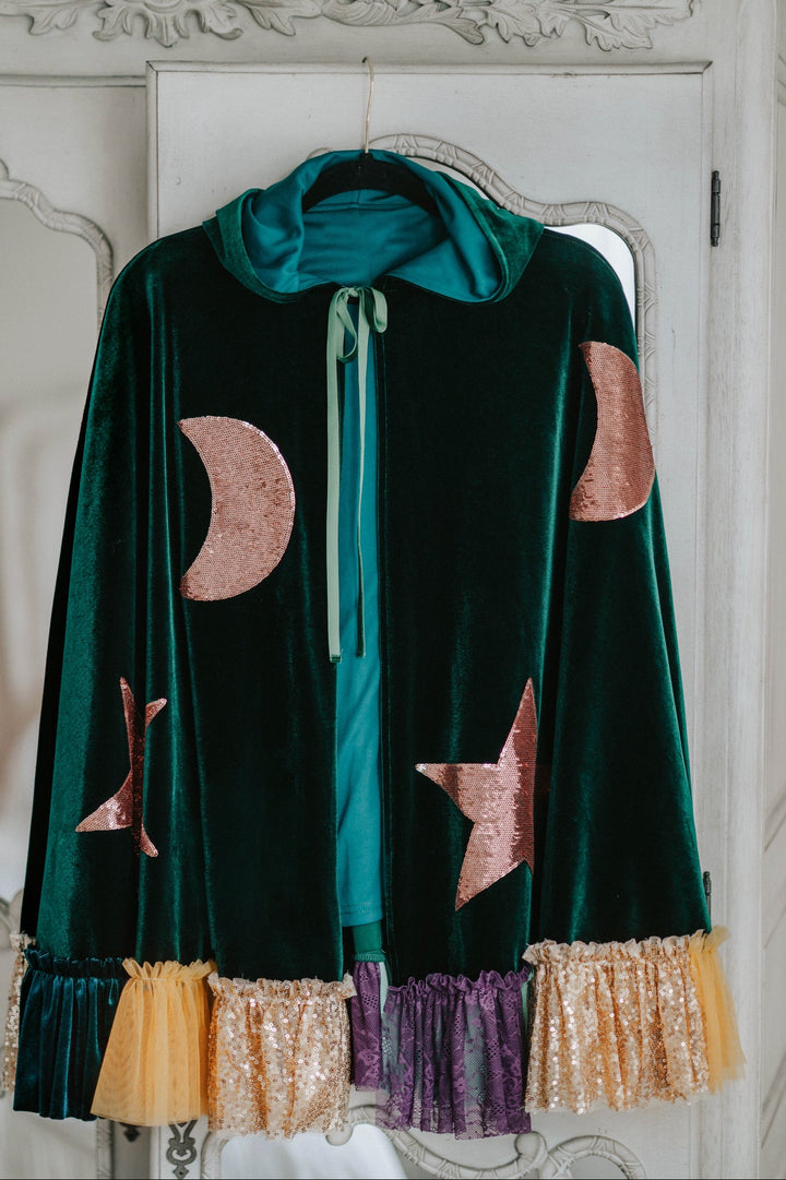 Flat lay front view of green velvet Hocus Pocus winifred sanderson inspired witch costume cape.