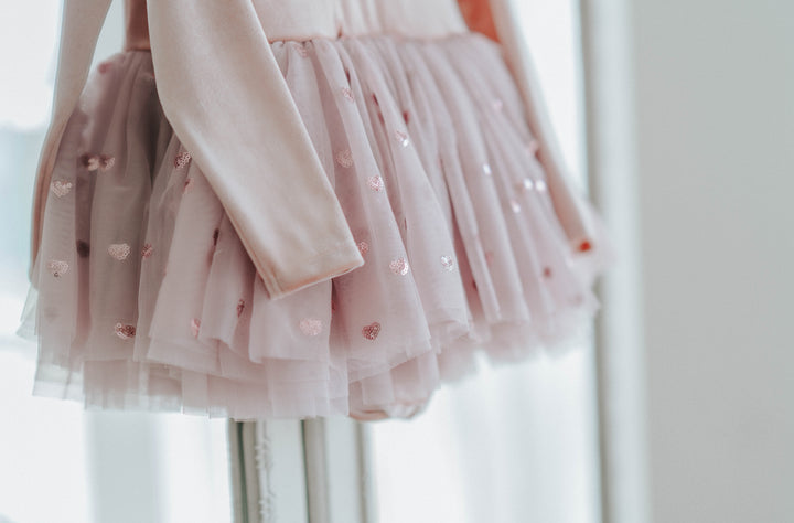 Layered heart sequin tulle skirt close-up, showing fullness and movement.