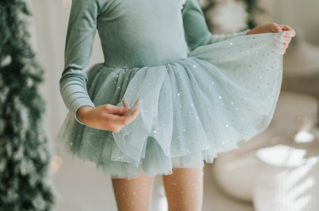 Detail of Willow sparkle tulle layers showing soft shimmer and airy movement.