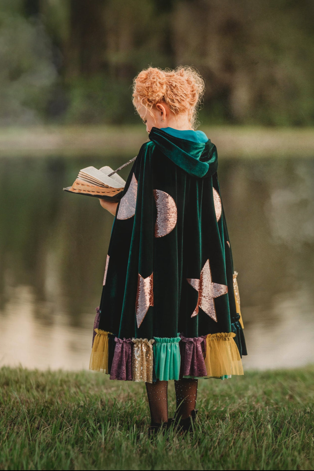 Back view of green Hocus Pocus inspired witch costume cape, kids Halloween outfit.
