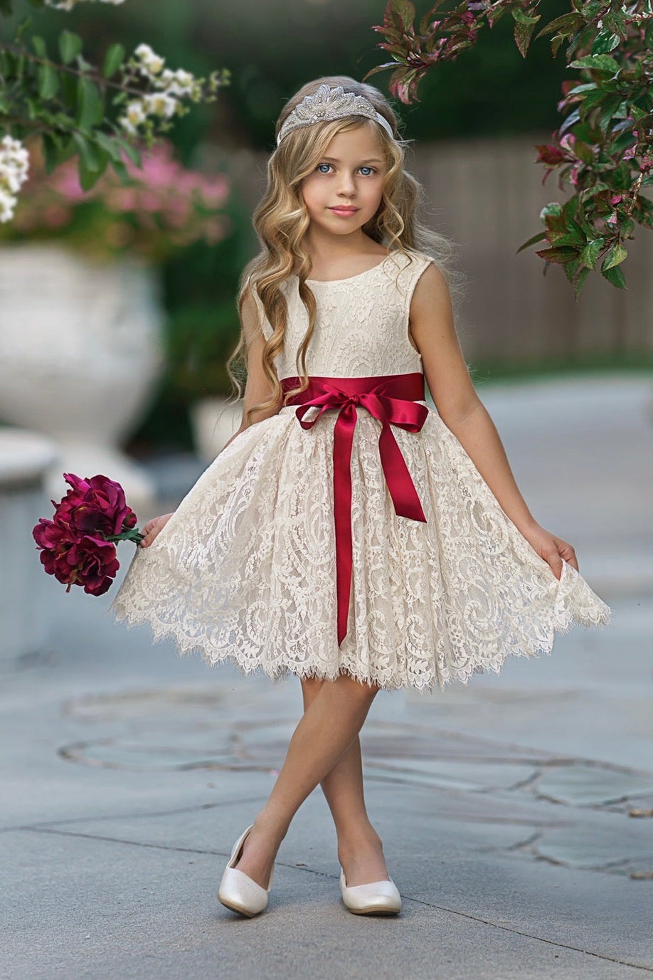 Antique ivory lace flower girl dress full body photo with classic bridal party styling