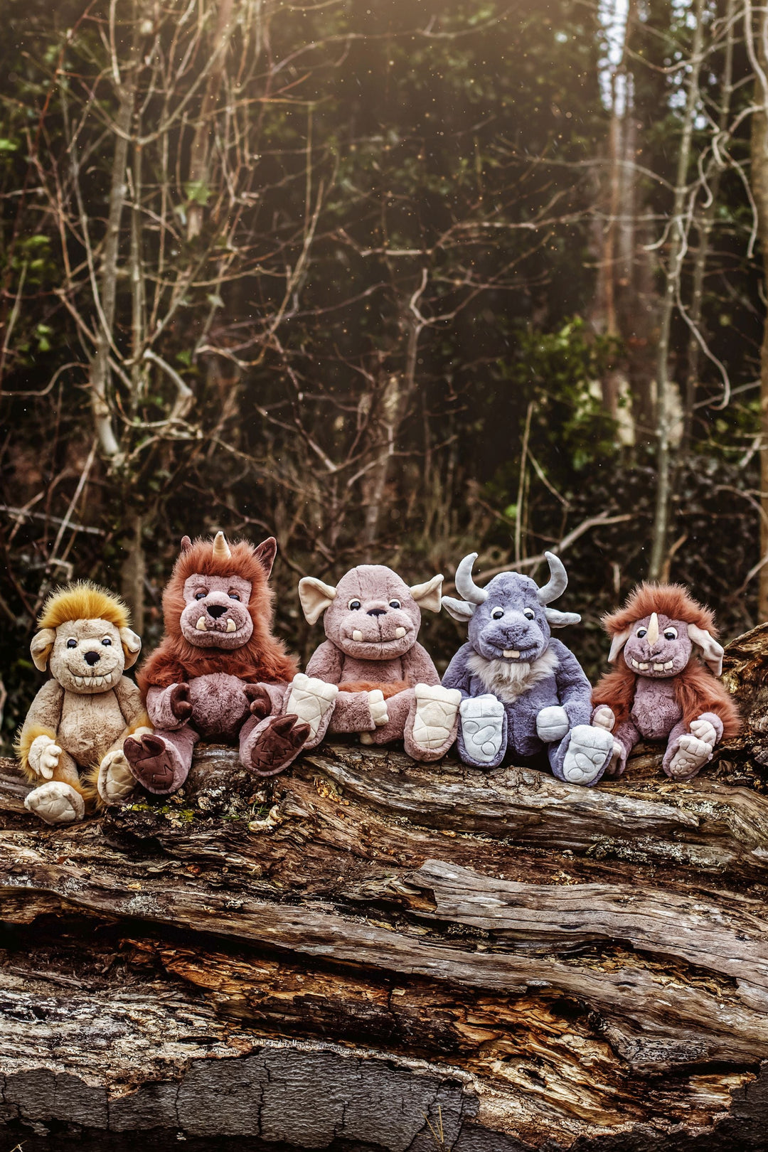 Charlie Bears Bearhouse plush toys group photo in woodland setting