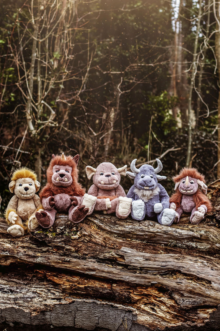 Charlie Bears Bearhouse plush toys group photo in woodland setting