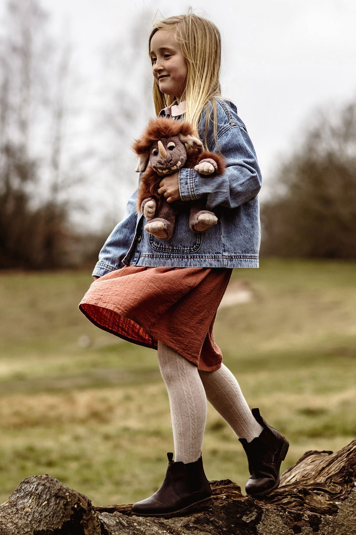 Pebble ogre plush toy back view on white background showing ogre details and shape