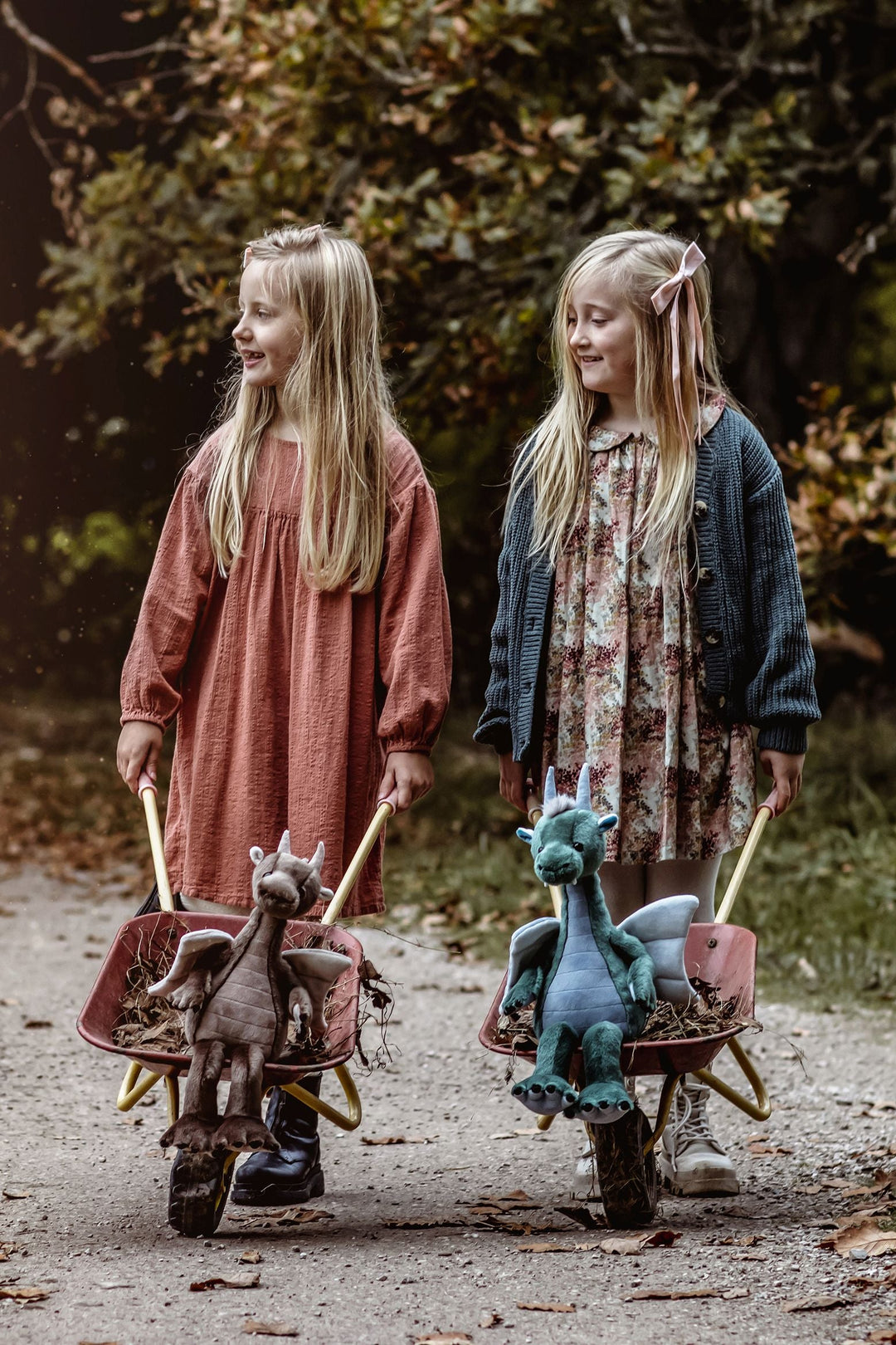 Charlie Bears Bearhouse dragon plush toys shown outdoors for size and scale