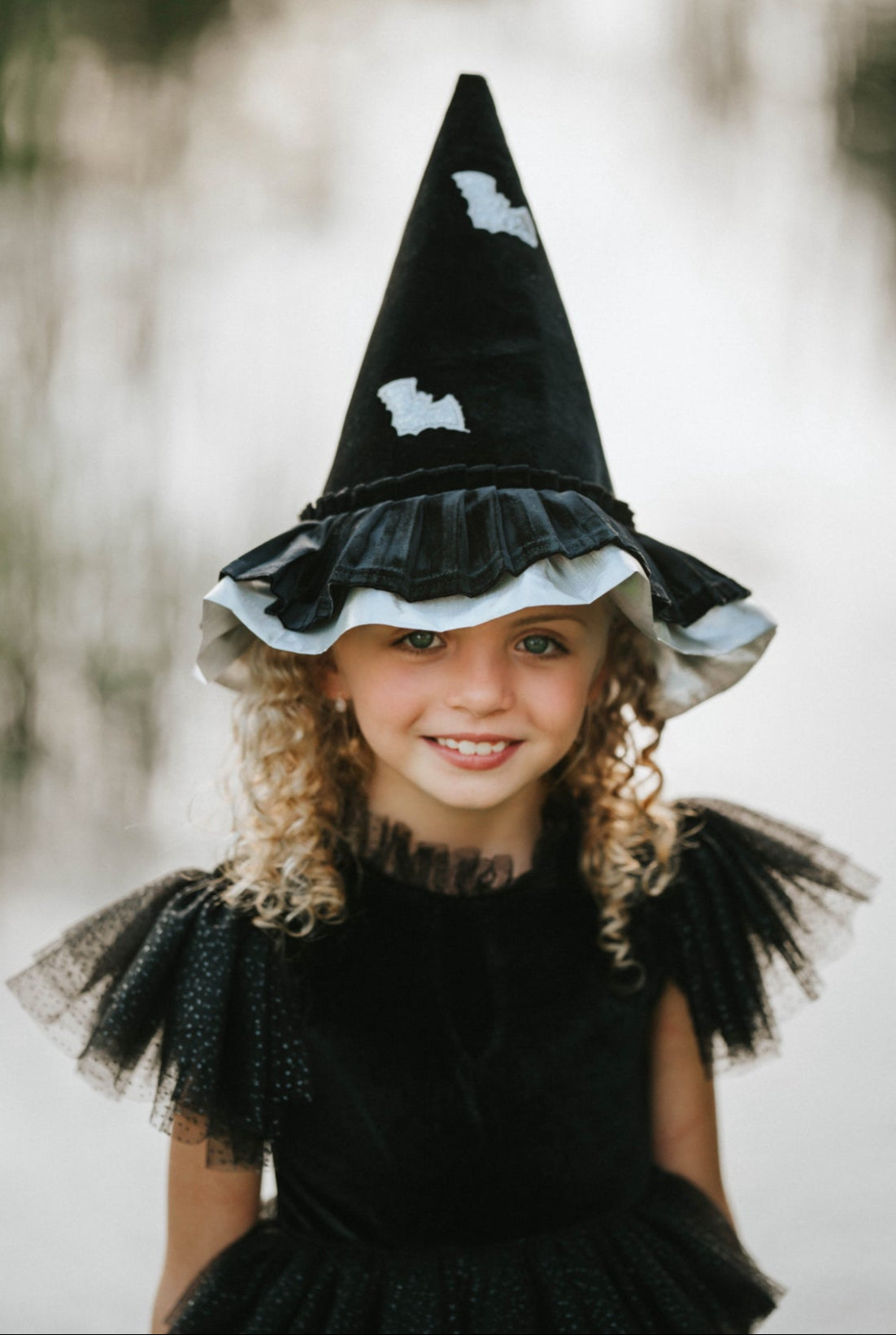 Black ruffled witch hat for Halloween dress-up