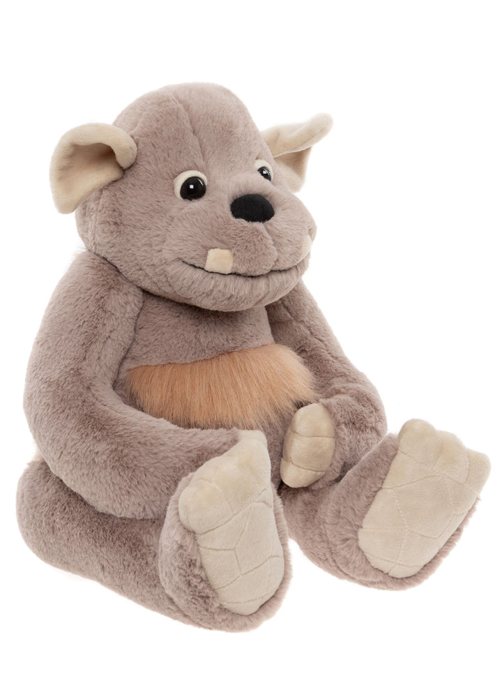 Boulder giant plush doll side profile with soft  grin