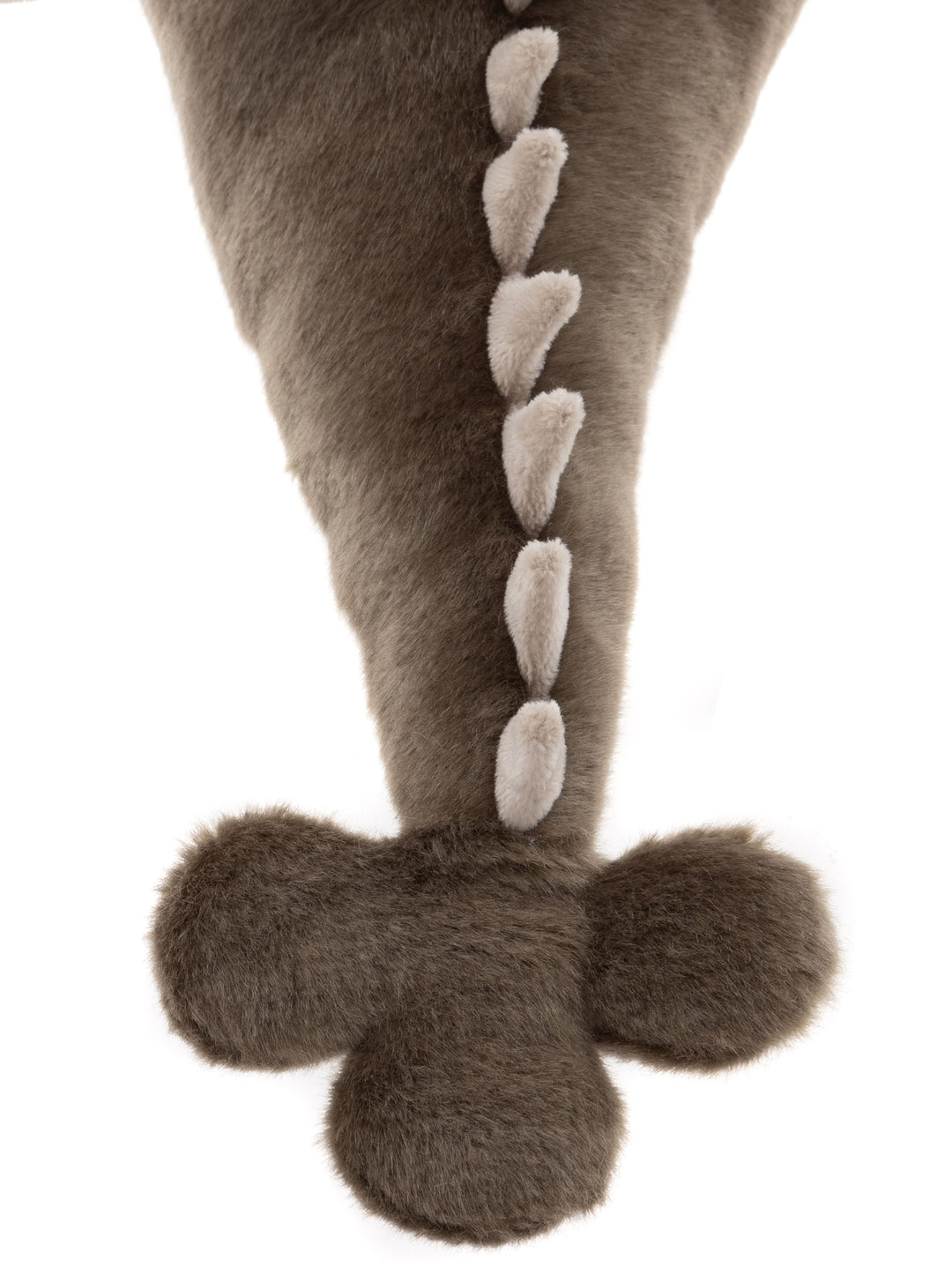 Close-up of Clubs Charlie Bears dragon plush showing stitched details and soft plush fabric
