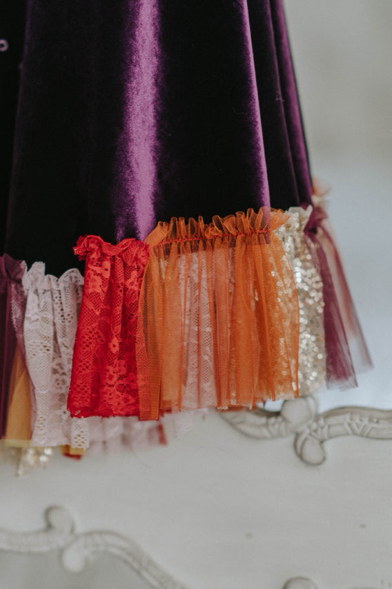 Hocus Pocus purple witch cape displayed on hanger – Sarah Sanderson inspired costume
