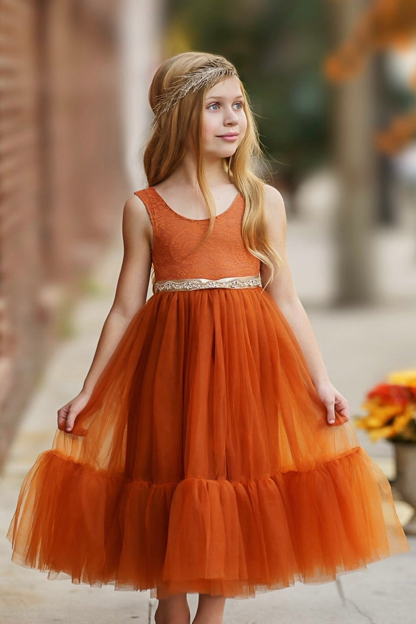 orange folklore dress Introducing 'Molefe the rental dress', our stunning burnt orange bridal gown! Make your wedding dreams come true with this breathtaking dress, available for rental! Contact us to inquire about rental details and
