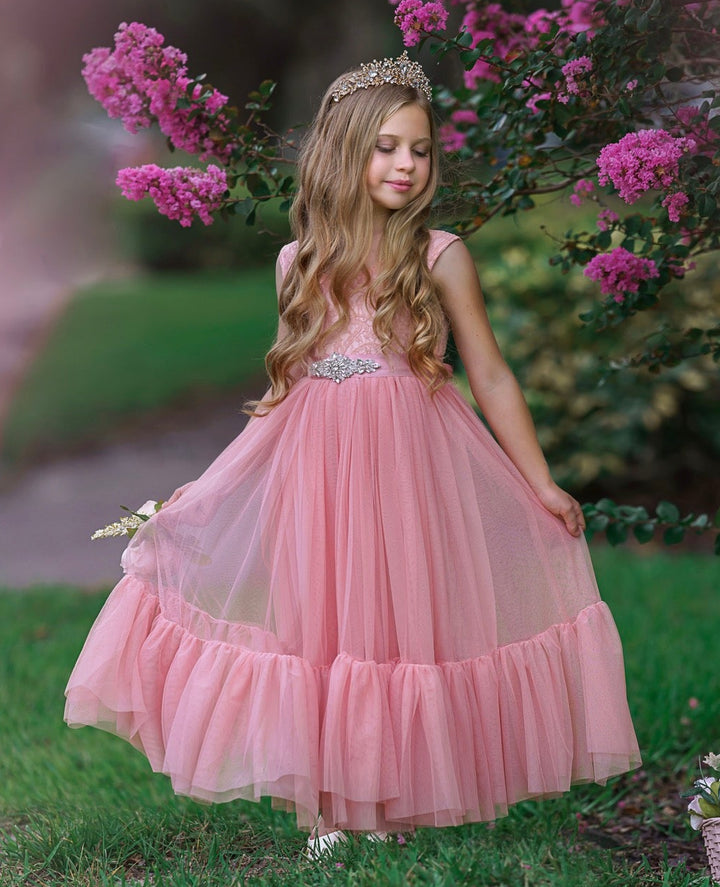 Rose pink sleeveless flower girl gown styled for portraits and garden wedding