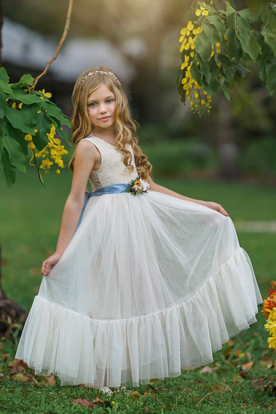 Classic antique ivory flower girl dress styled for wedding ceremony portraits