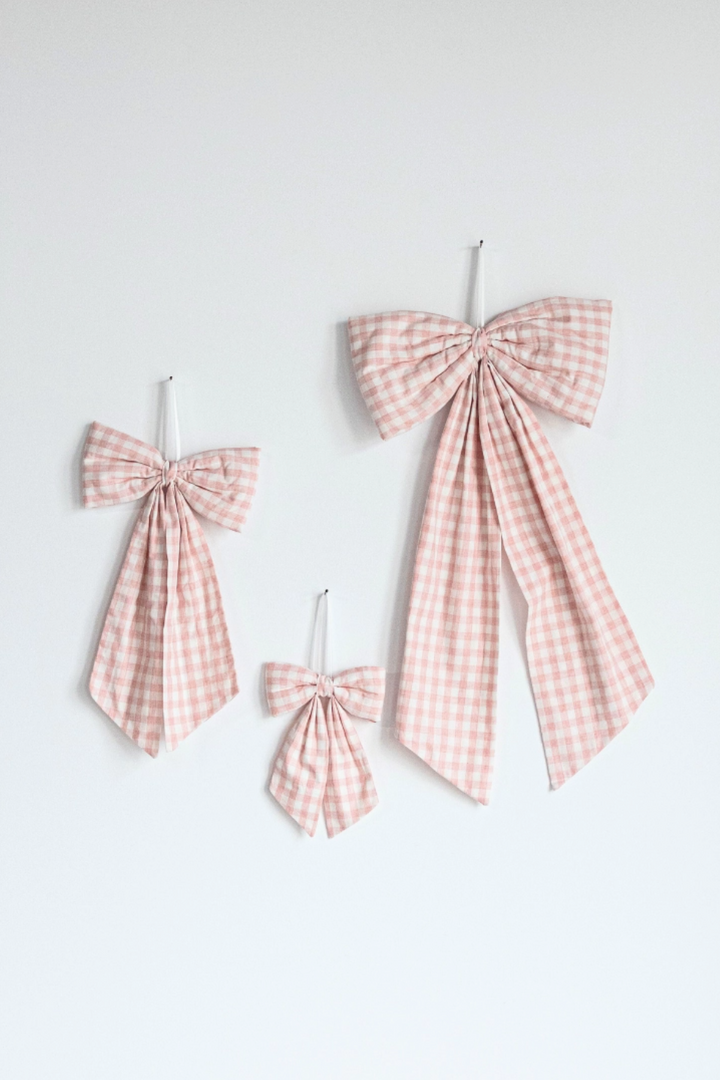 Pink gingham fabric bow for wreaths, Christmas trees, gifts, and nursery styling.