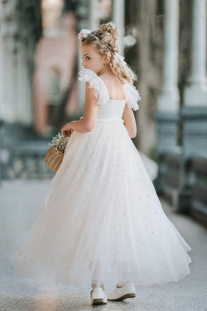 Ivory fleur flower girl dress with embroidered floral tulle and ruffle sleeves, back view of elegant ivory flower girl wedding dress