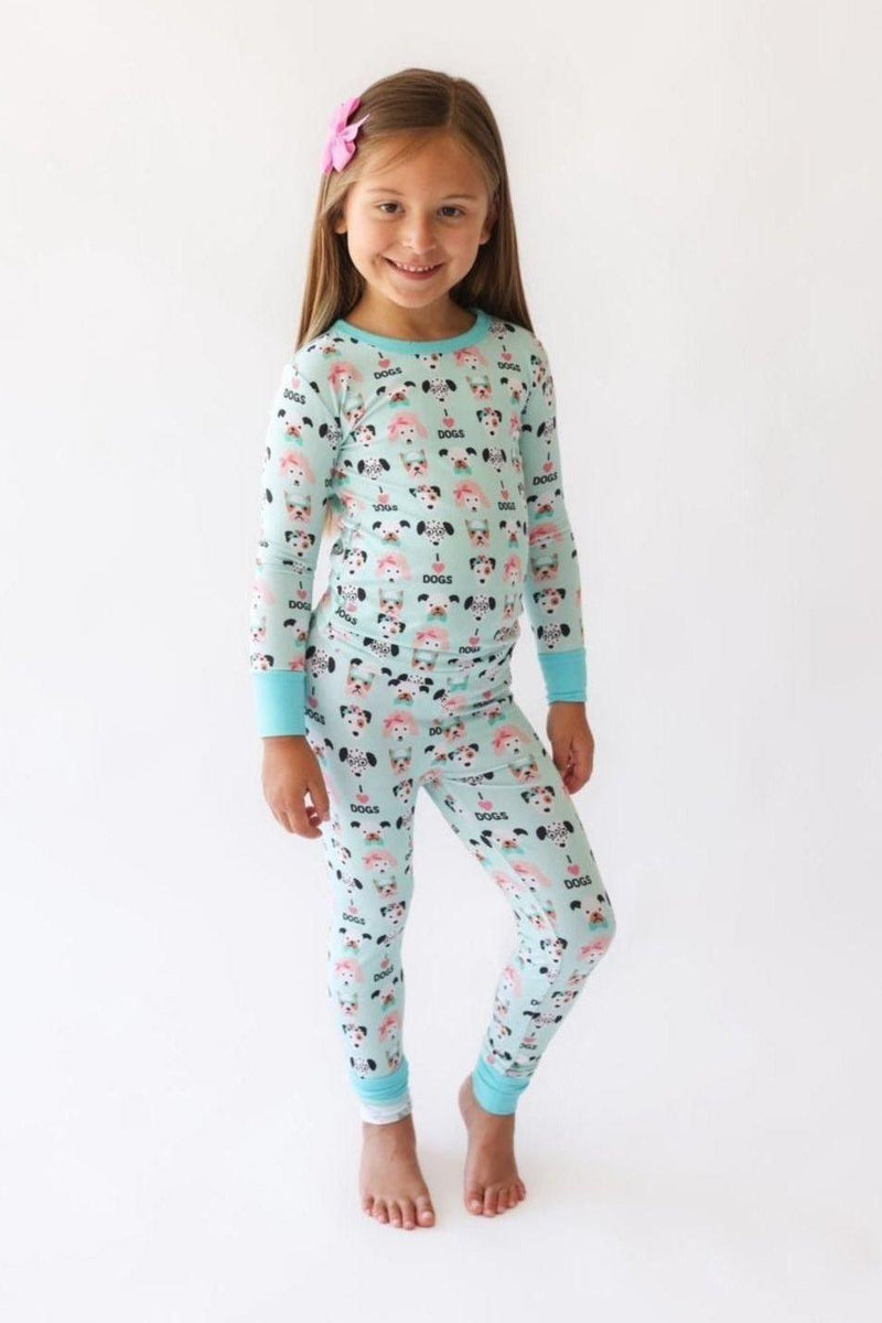 Child wearing I Love Dogs bamboo two-piece pajama set featuring hand-drawn dog print