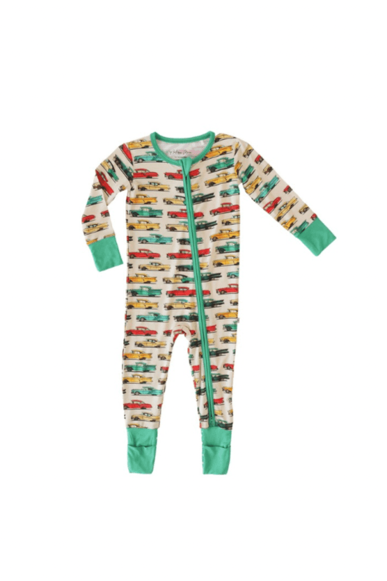 Flat lay of classic cars bamboo zipper pajamas for babies and toddlers, featuring a vintage car print on soft blue fabric with dual zipper and fold-over feet.
