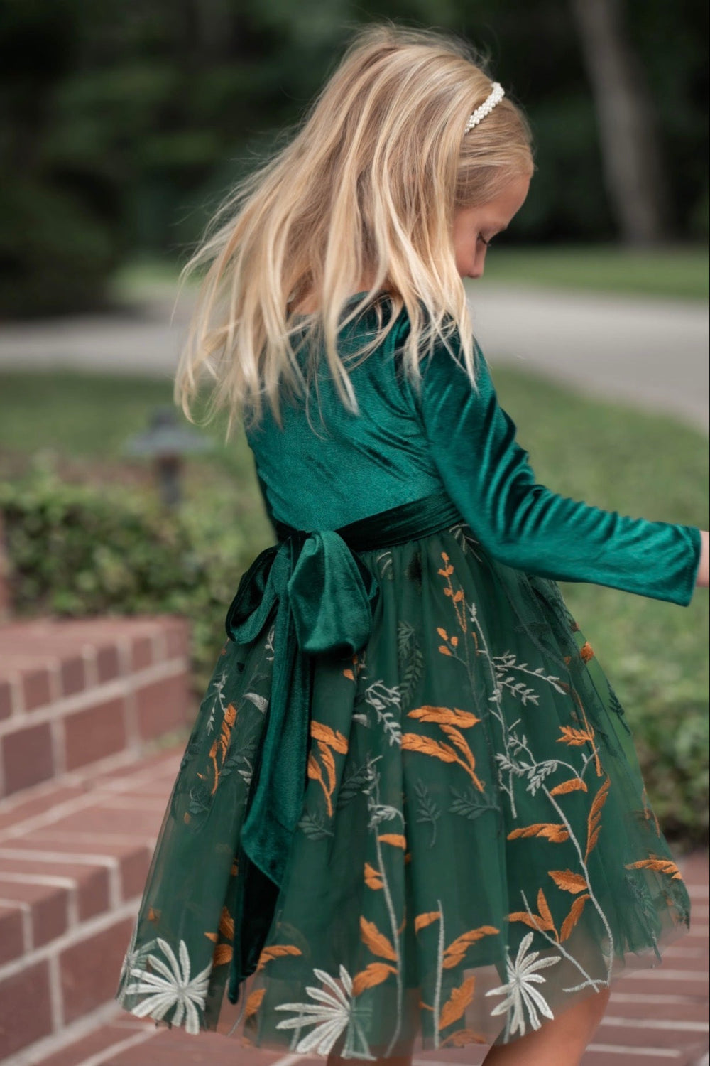 Green velvet bodice wedding dress with floral embroidered overlay