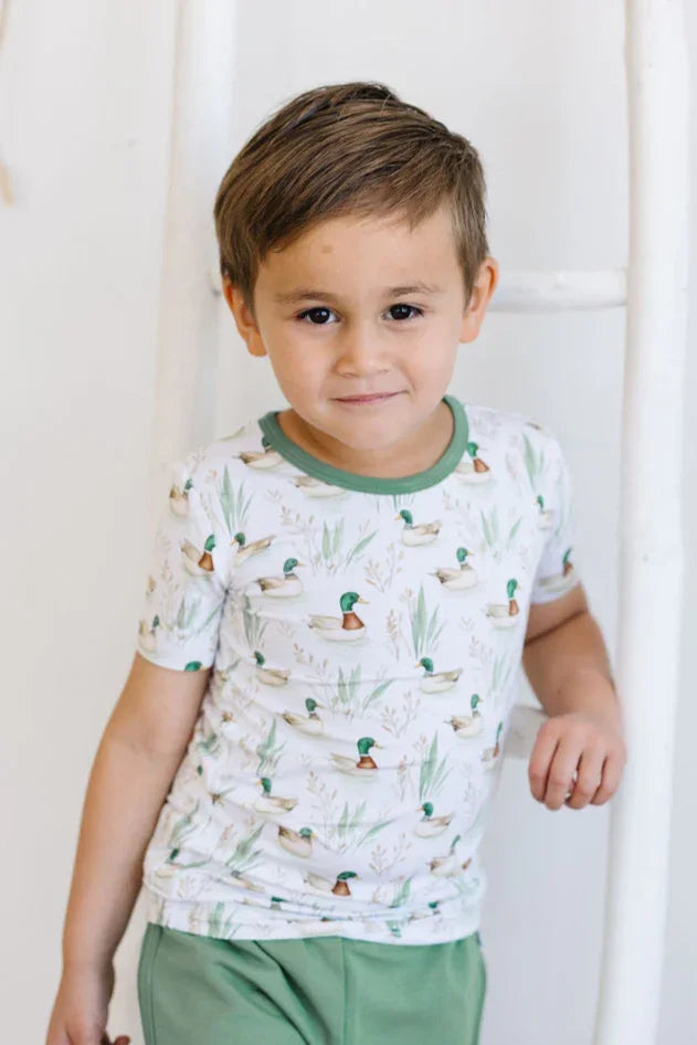 Kids short sleeve bamboo T-shirt with mallard duck graphic, shown in flat lay on white background.