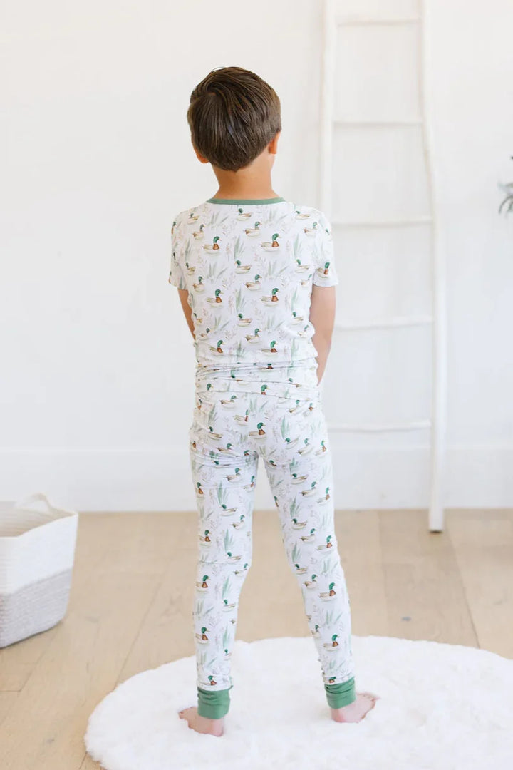 Back view of mallard duck bamboo pajama set with short sleeve top and long pants, unisex design for kids.