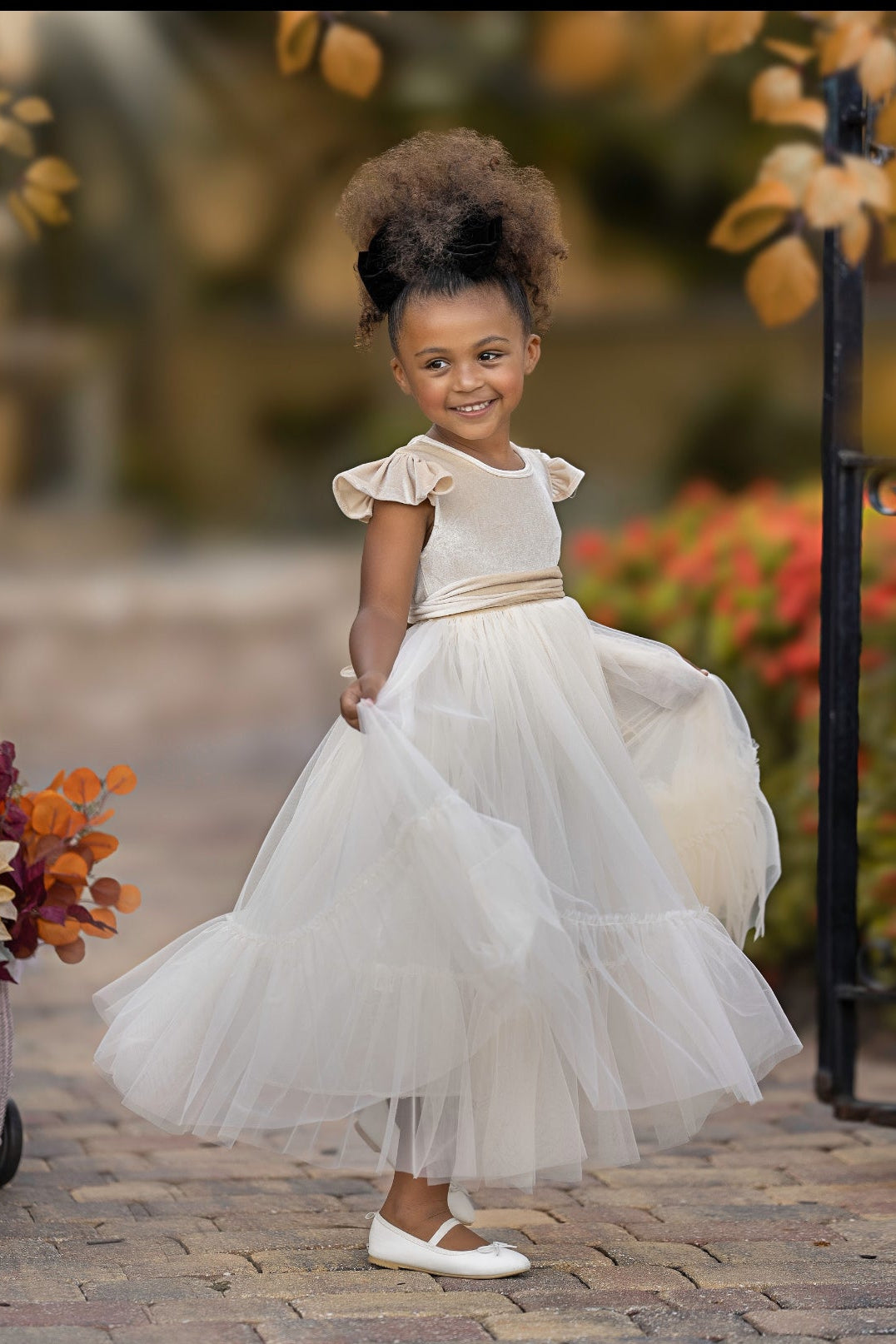Marcella champagne velvet flower girl dress with flowing tulle skirt, soft romantic wedding style