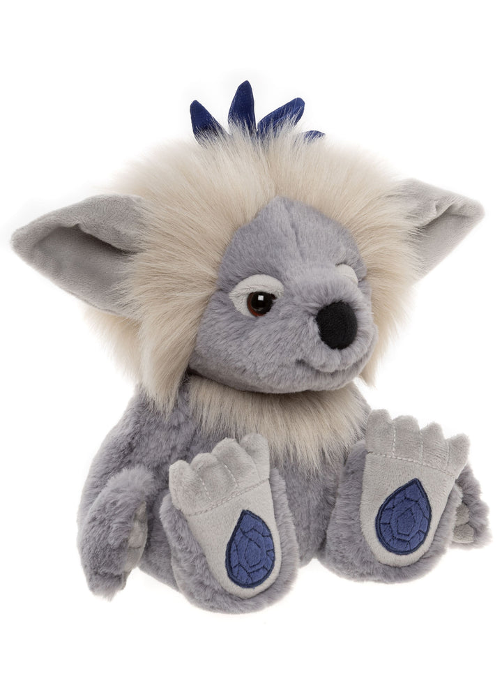 Sapphire Sue Crystal Troll plush by Charlie Bears side view with blue-grey fur, fluffy mane and sapphire gemstone paw pads