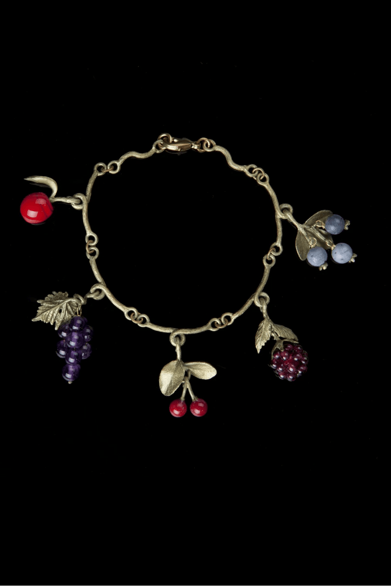 Michael Michaud Fruit Charm Bracelet featuring handcrafted apple, grape, cherry, raspberry, and blueberry charms in cast bronze with gemstone accents