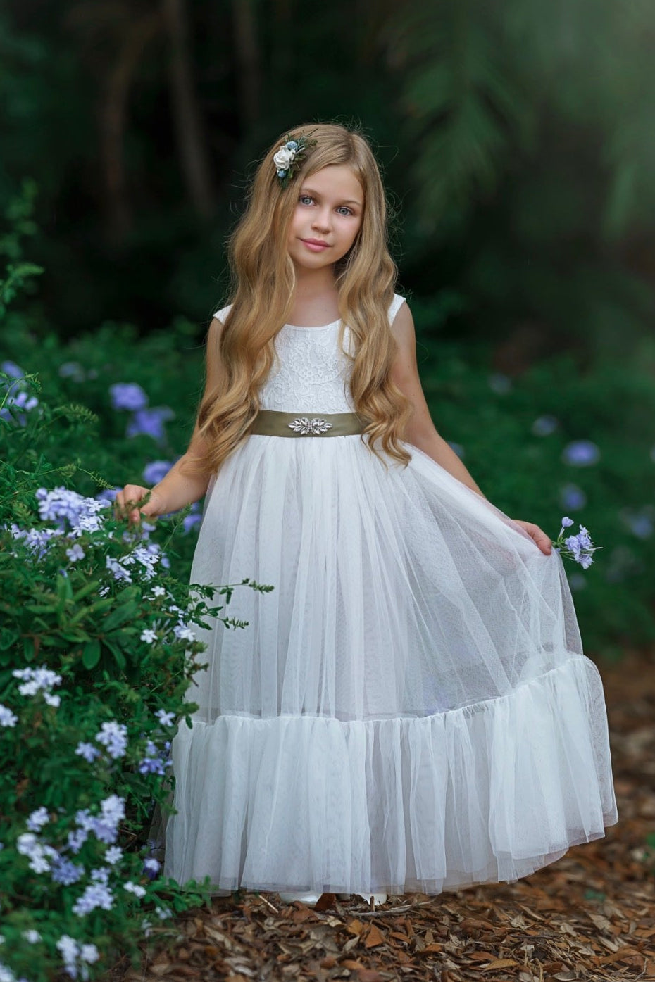  view of soft white flower girl dress showing eyelash lace V-back and long tulle skirtront