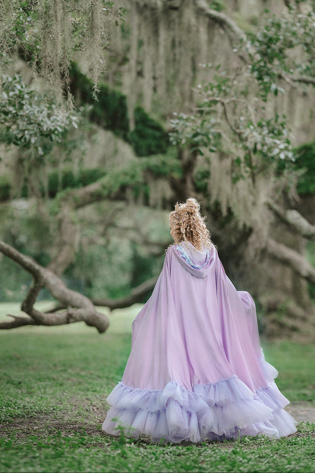 Back view of Amorette lavender princess cape with hood and dramatic floor-length layered tulle ruffle hem