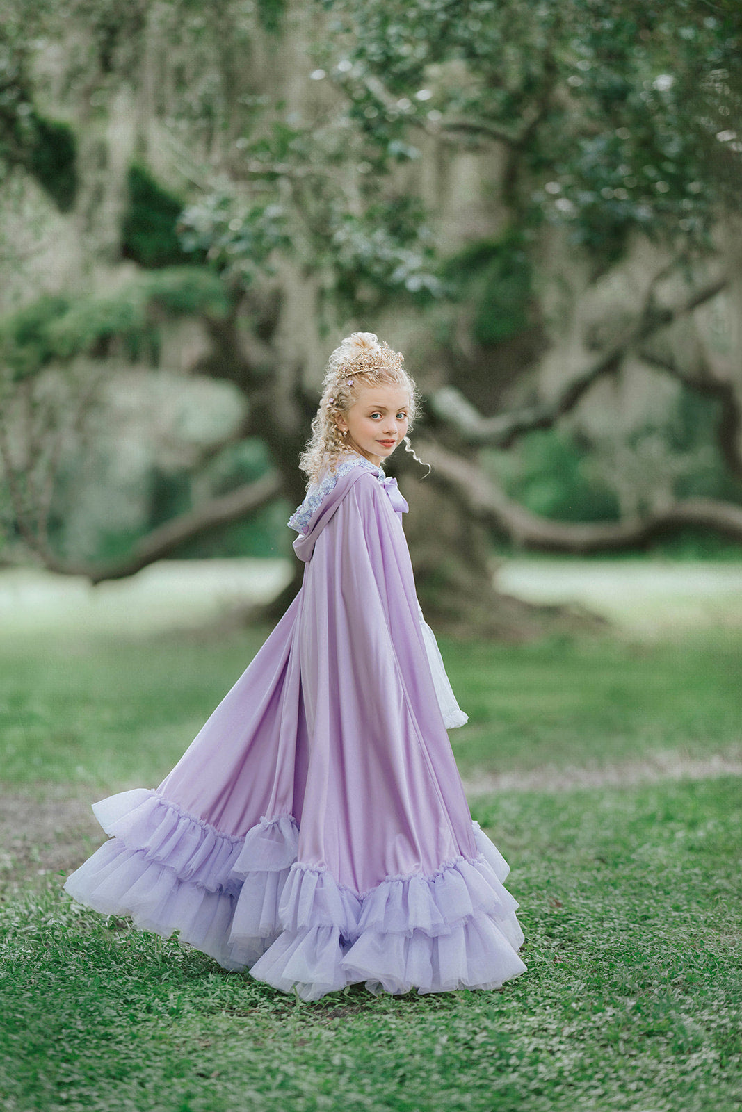 Side view of Amorette lavender princess cape with hood and dramatic floor-length layered tulle ruffle hem