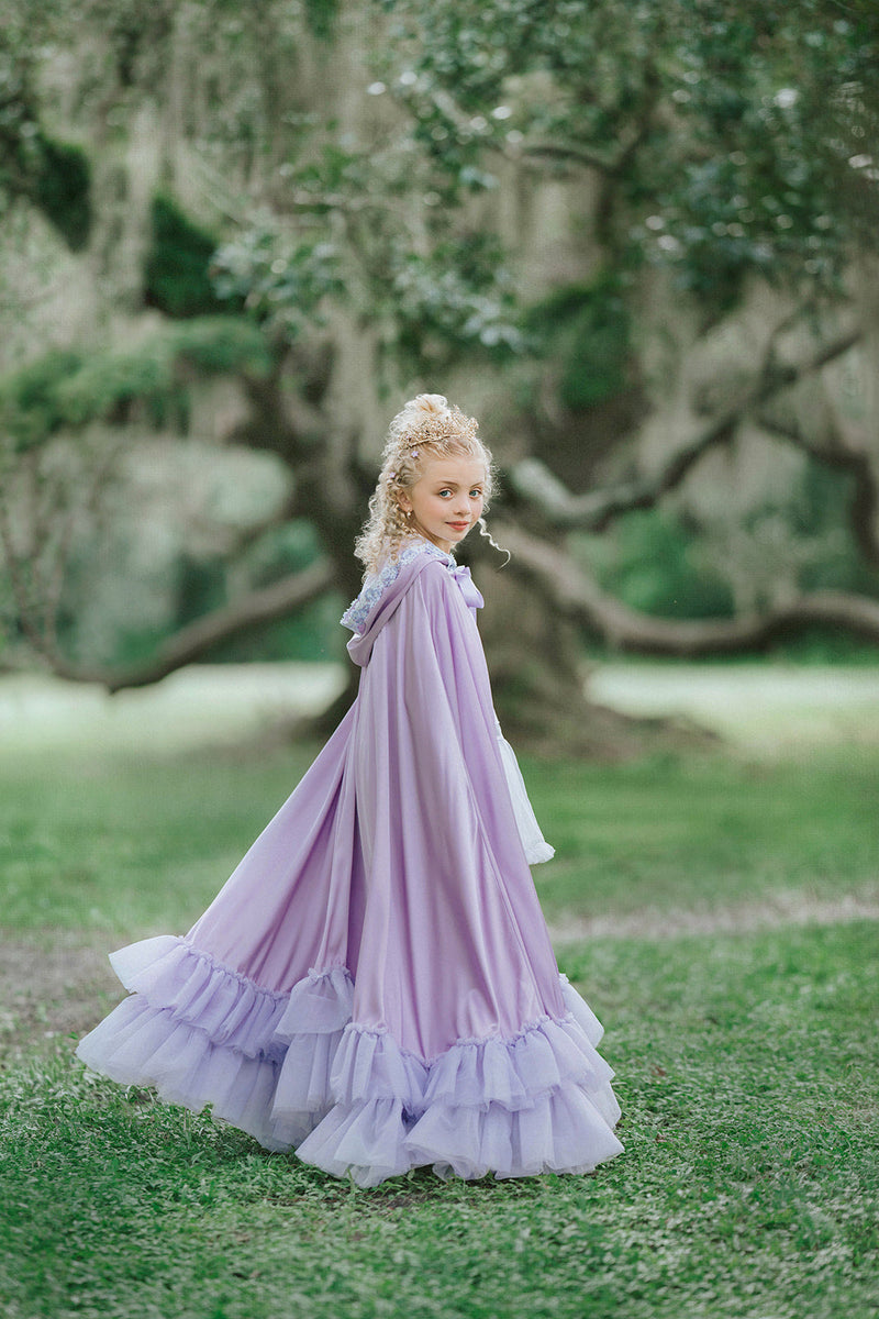 Side view of Amorette lavender princess cape with hood and dramatic floor-length layered tulle ruffle hem
