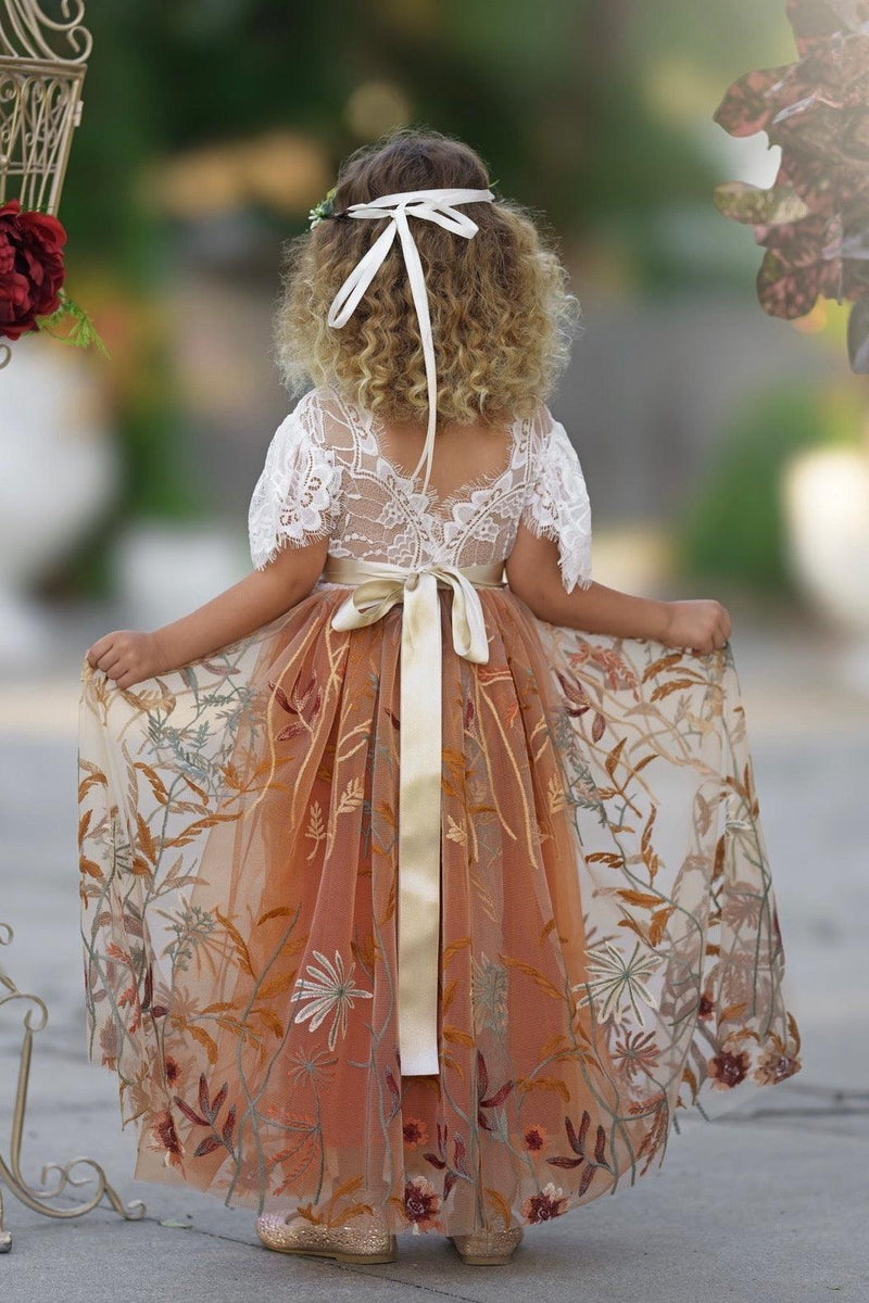 Back view of Camellia flower girl dress with V-shaped lace bodice and burnt orange embroidered floral tulle skirt