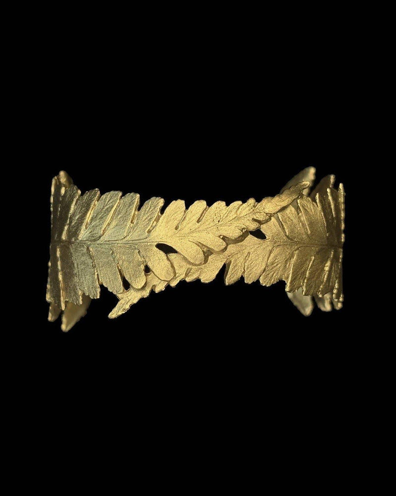 Fern Cuff Bracelet in hand-finished bronze with sculptural fern leaves inspired by woodland foliage