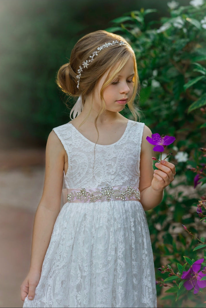 Soft white heirloom lace flower girl dress close up Eloise