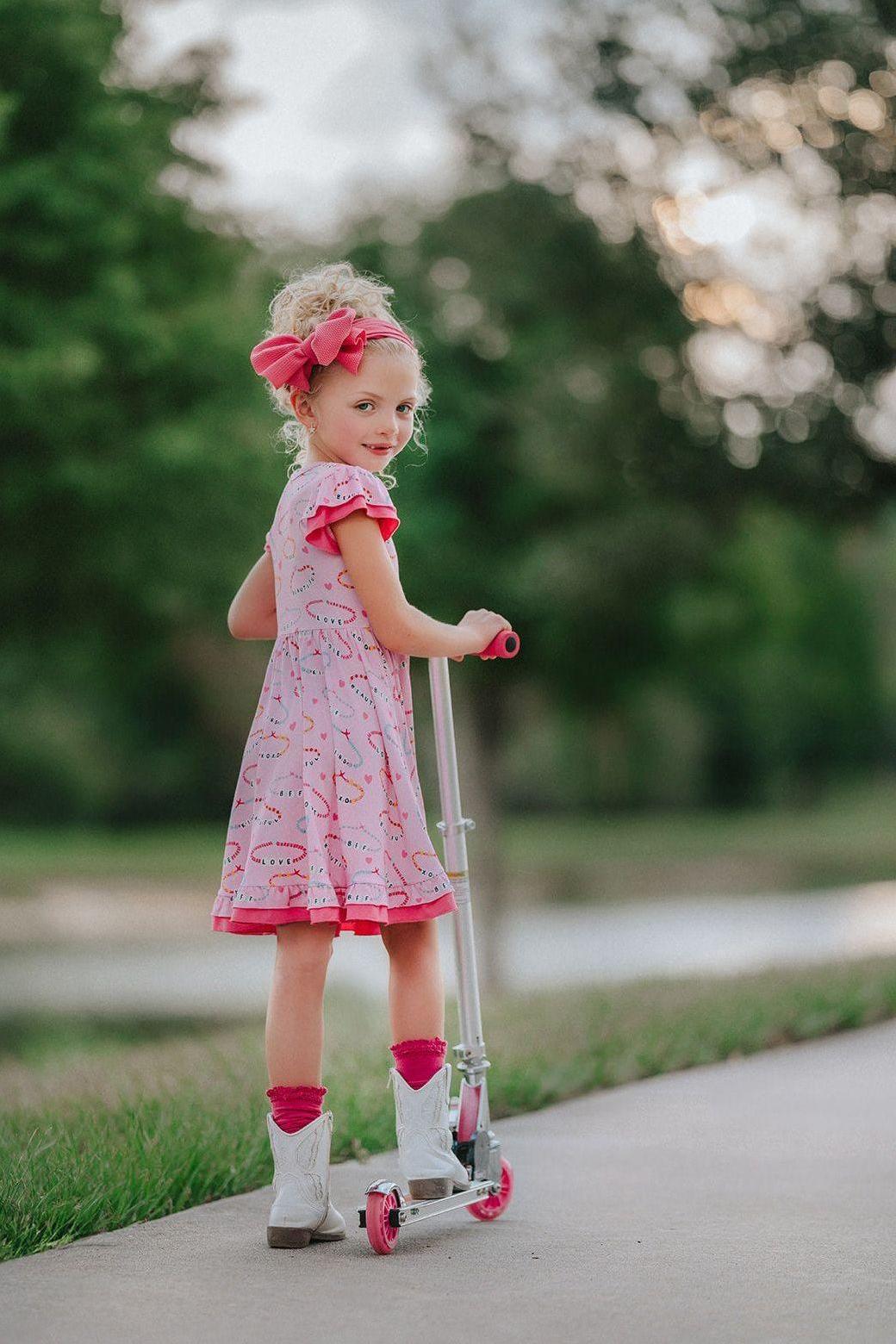 Girls Bamboo Twirl Dress - Pink Friendship Bracelet Print