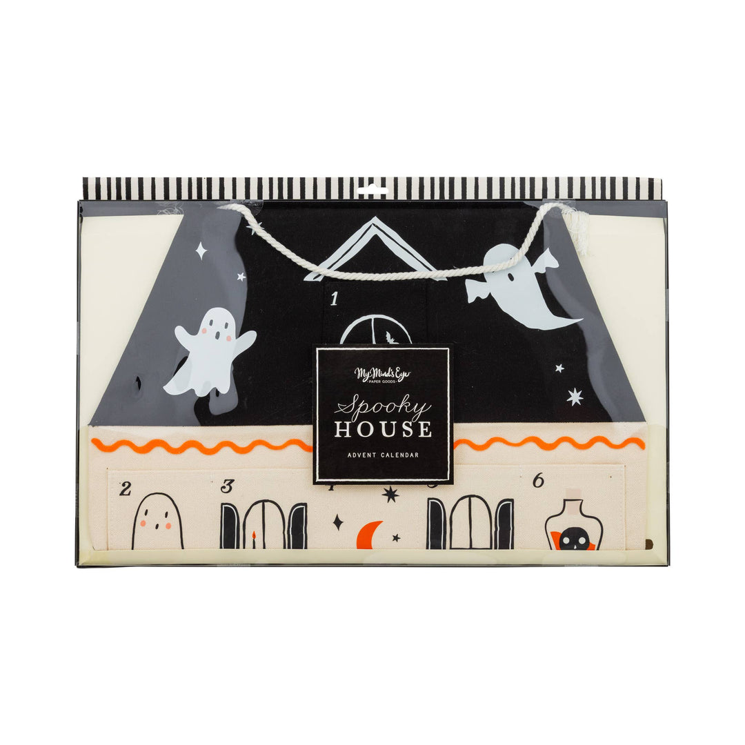 Halloween-themed advent calendar with ghost and house design on a white background