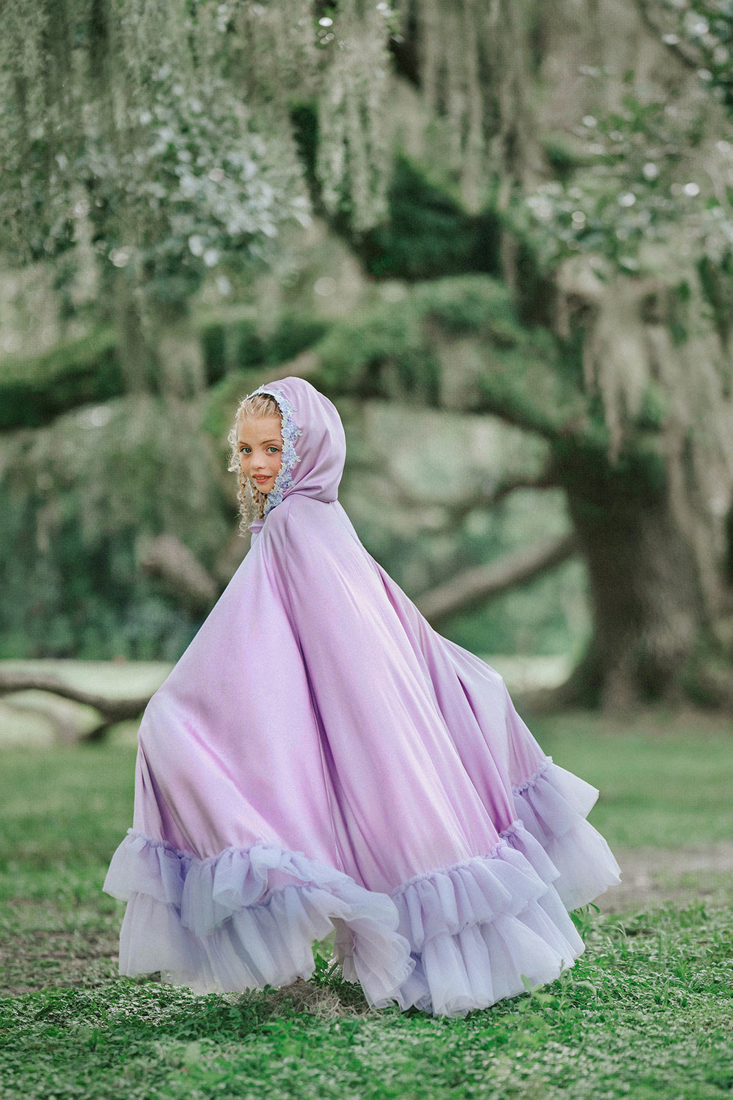 Amorette lavender princess cape flowing in motion with layered tulle ruffles for magical dress-up and Halloween