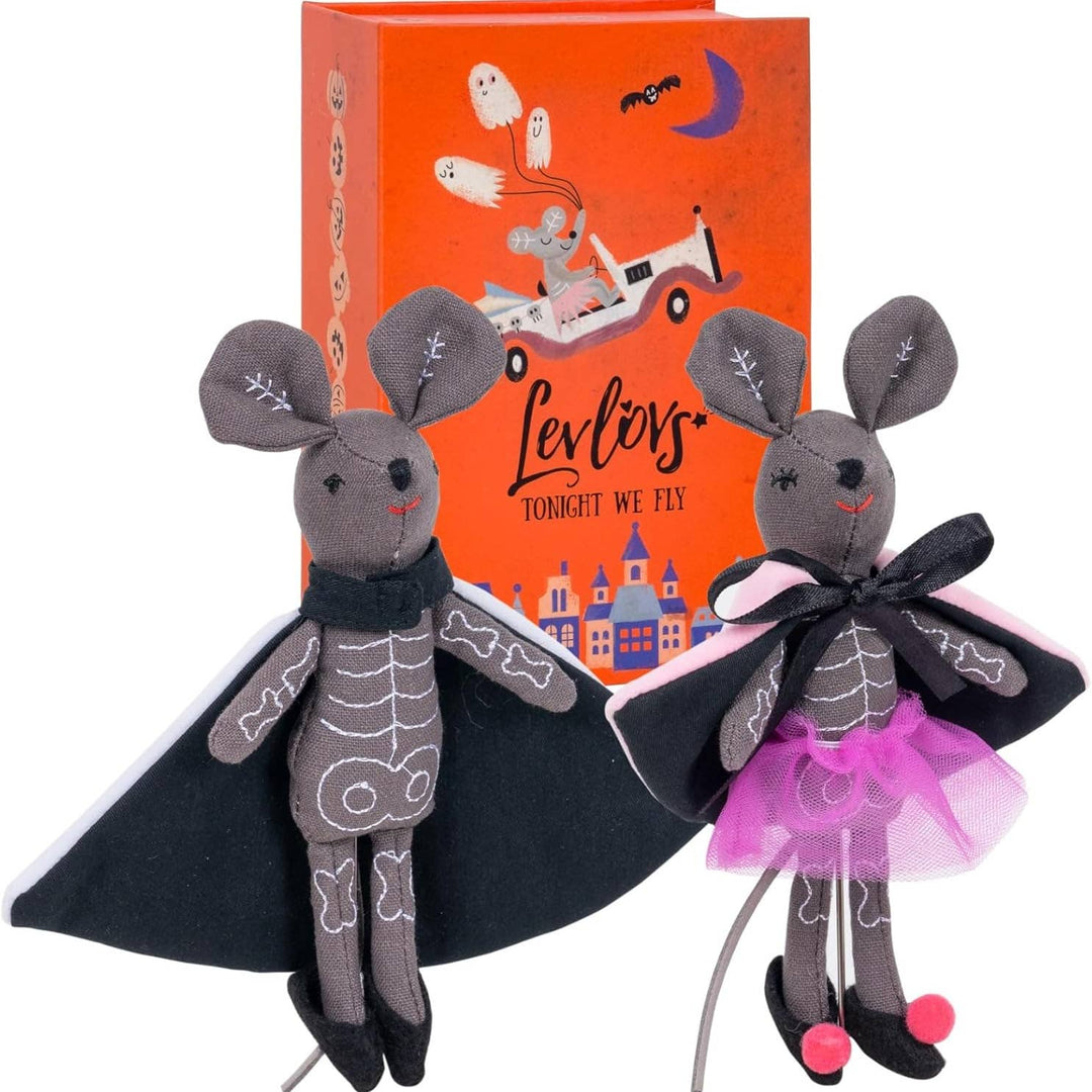 LevLovies “Tonight We Fly” Halloween mice displayed in front of their illustrated storybook keepsake box, featuring two handcrafted skeleton mice wearing black capes, one with a whimsical purple tulle skirt.