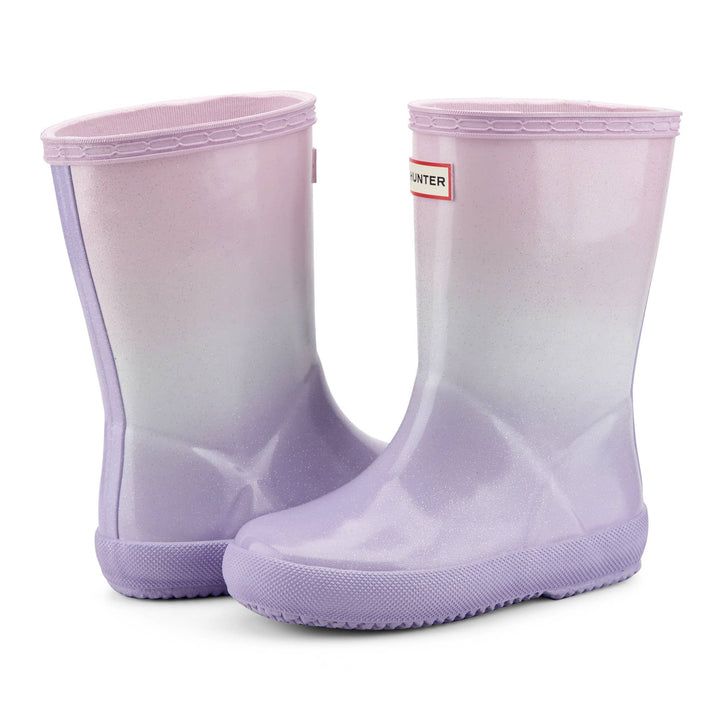 Hunter Boots Kids First Starcloud pink white and purple ombre waterproof rain boots pair view