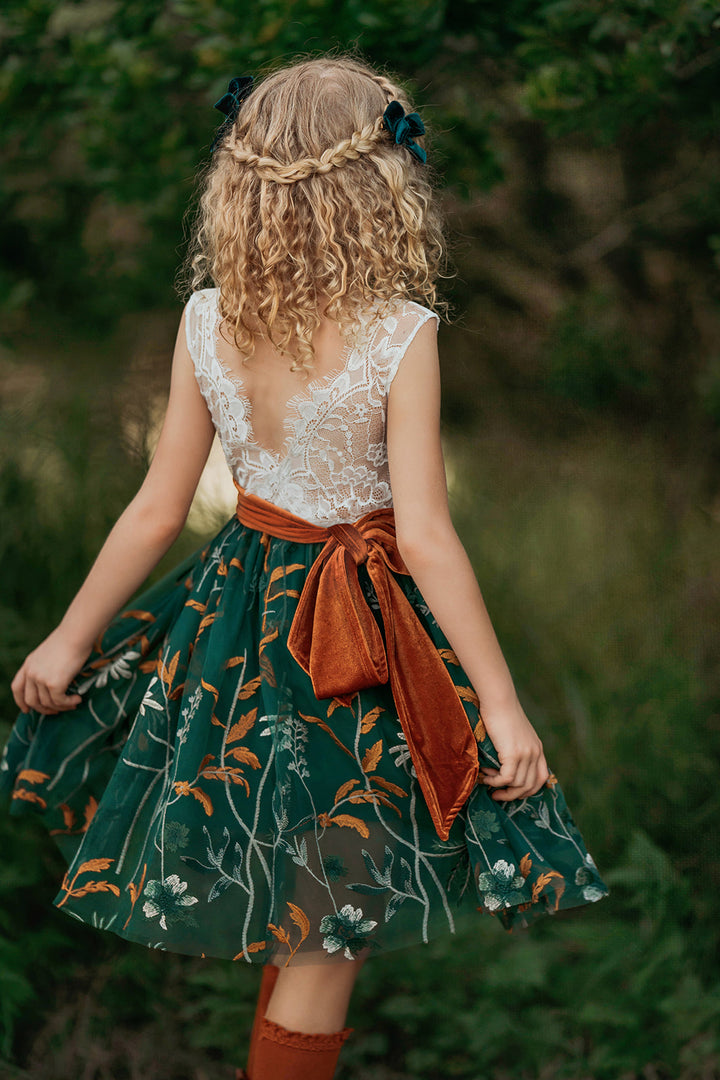 knee length flower girl dress forest green tulle skirting with burnt orange velvet sash