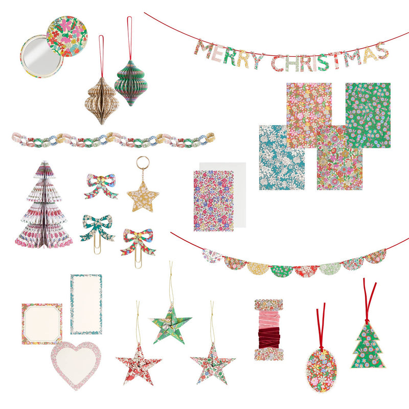 Liberty floral Christmas advent calendar opened to reveal 24 festive gift boxes