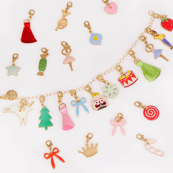 Meri Meri Nutcracker Advent Calendar suitcase with ballet characters and gold-tone charm bracelet