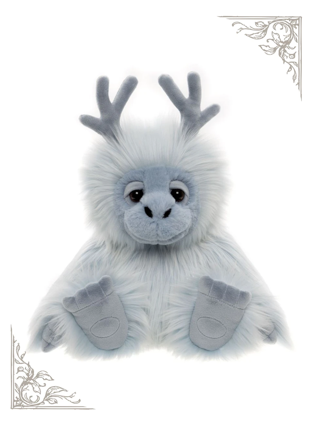 Oomph the Yeti, a 10-inch blue and white Bearhouse by Charlie Bears plush with soft antler-like horns, front view