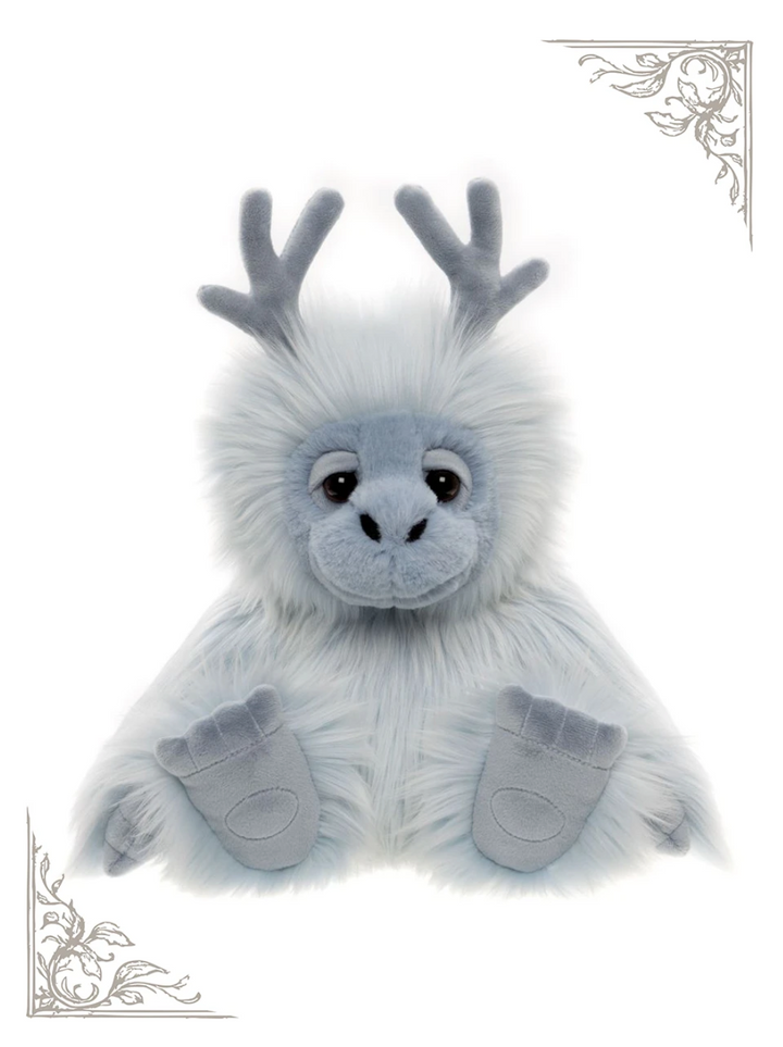 Oomph the Yeti, a 10-inch blue and white Bearhouse by Charlie Bears plush with soft antler-like horns, front view