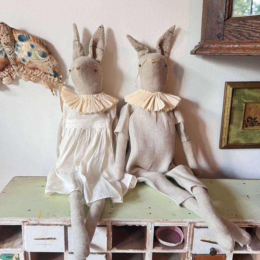 Pair of handcrafted bunny ragdolls styled as heirloom nursery décor and collectible art dolls