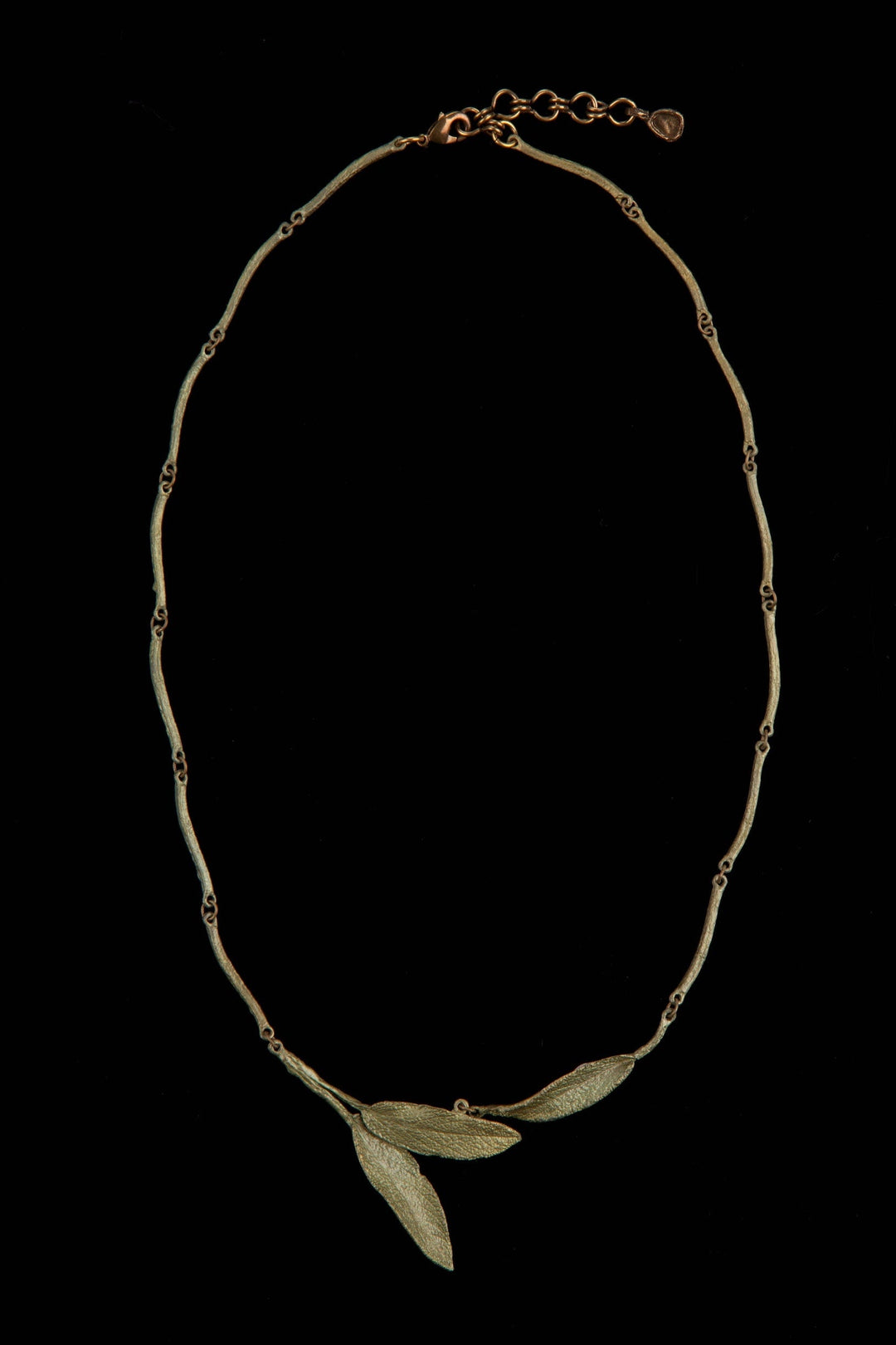 Michael Michaud Strawberry Pendant Necklace featuring a flame-worked red glass berry on an adjustable bronze chain