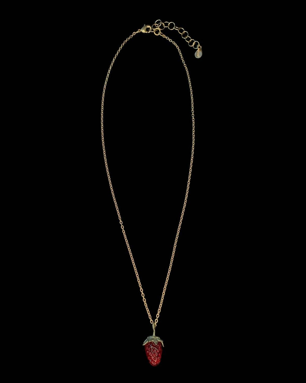 Michael Michaud Strawberry Pendant Necklace featuring a flame-worked red glass berry on an adjustable bronze chain