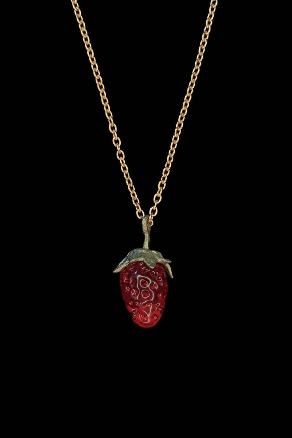 Michael Michaud Strawberry Pendant Necklace featuring hand-patinated bronze leaves and flame-worked red glass berry