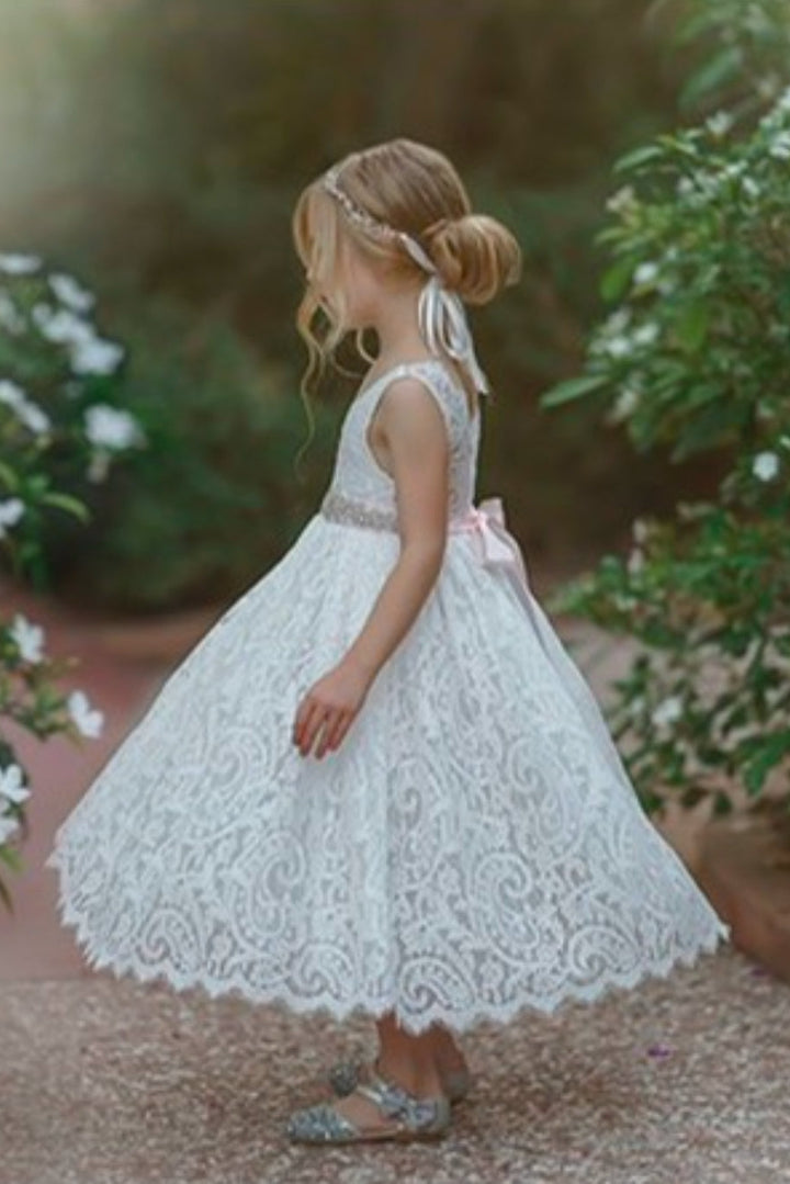 Soft white heirloom lace flower girl dress close up Eloise