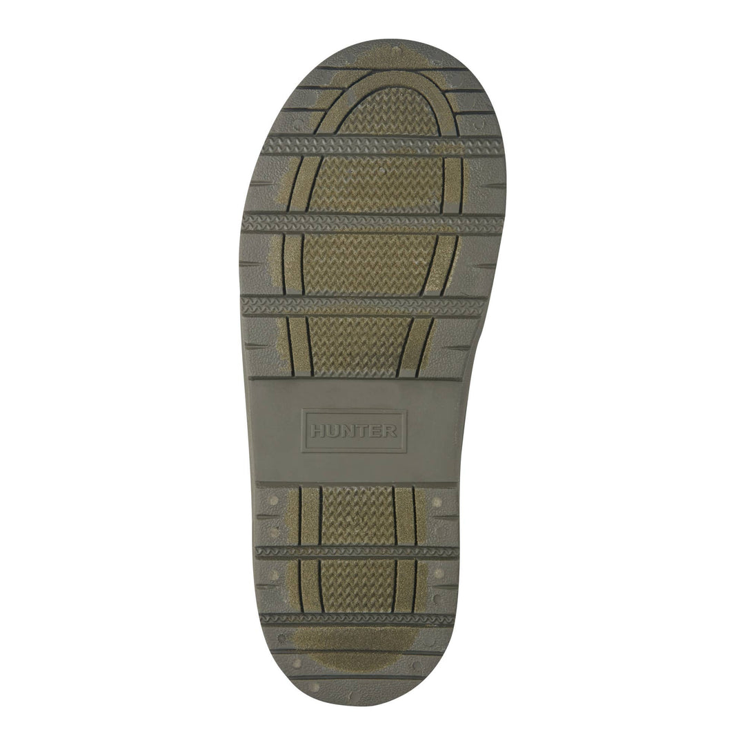 Black rubber sole of a shoe with 'Hunter Boots' branding on a white background